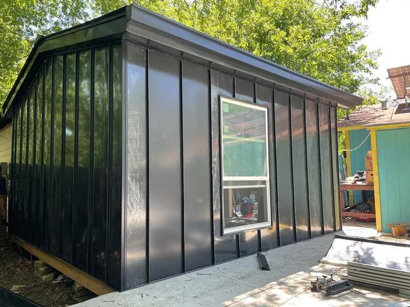 Black standing seam metal wall panels for Roof Inspection in Barbecue