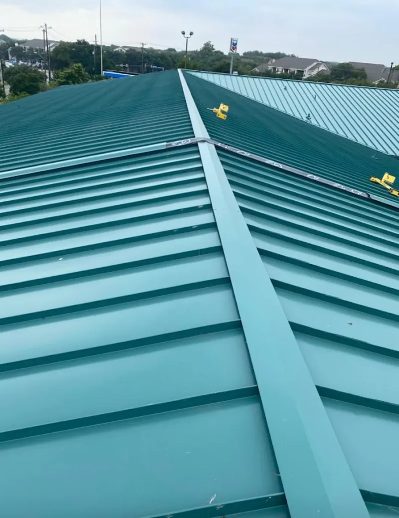 Green commercial metal roof ridge and valley for Metal Roof Repair in Barbecue
